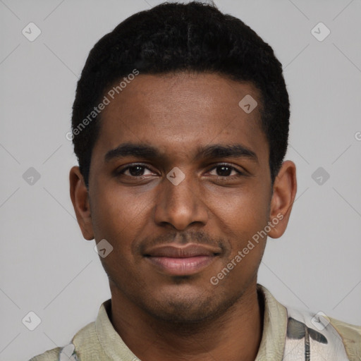 Joyful black young-adult male with short  black hair and brown eyes