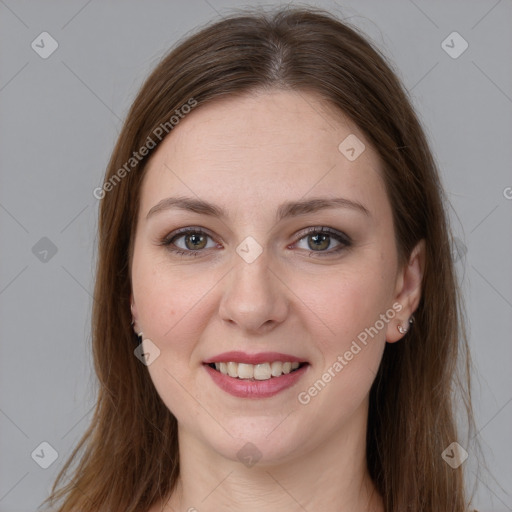 Joyful white young-adult female with long  brown hair and grey eyes