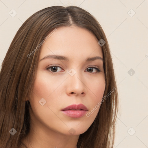 Neutral white young-adult female with long  brown hair and brown eyes