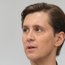 Neutral white adult male with short  brown hair and brown eyes