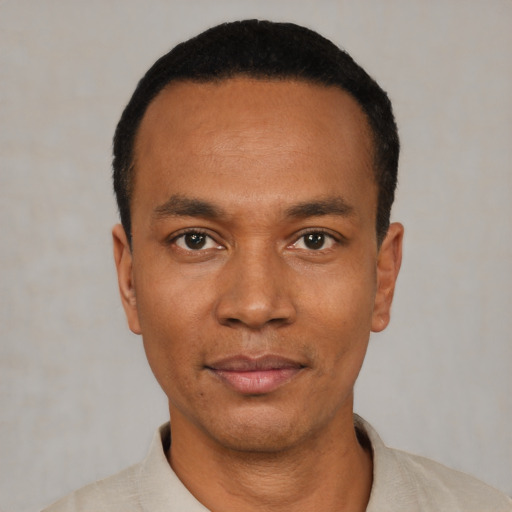 Neutral black young-adult male with short  black hair and brown eyes