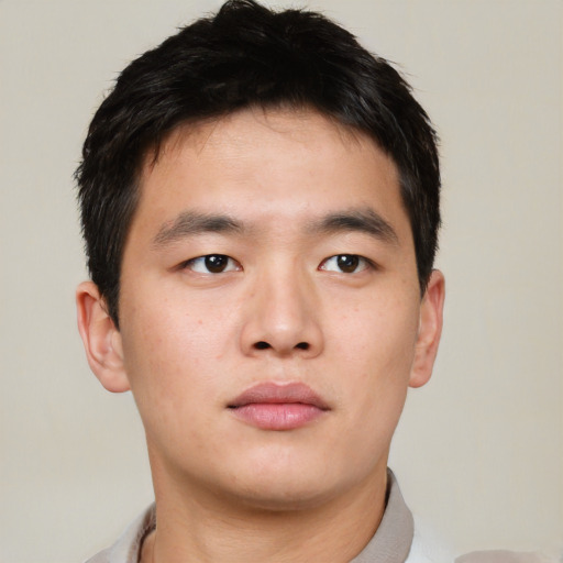 Neutral asian young-adult male with short  brown hair and brown eyes