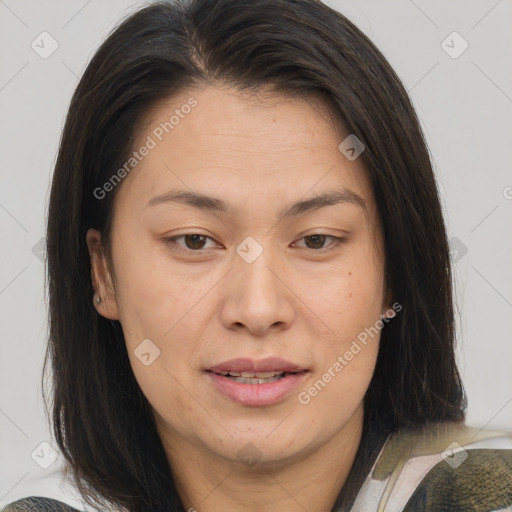 Joyful white adult female with medium  brown hair and brown eyes