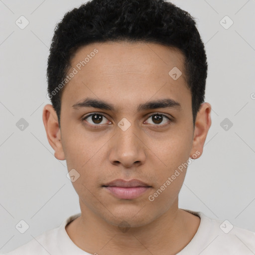 Neutral latino young-adult male with short  black hair and brown eyes