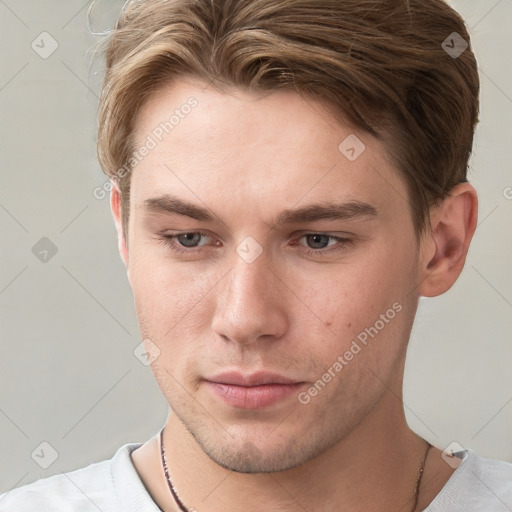 Neutral white young-adult male with short  brown hair and grey eyes