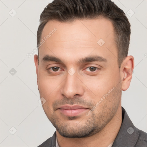 Neutral white young-adult male with short  brown hair and brown eyes