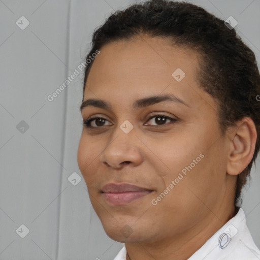 Joyful latino young-adult female with short  brown hair and brown eyes