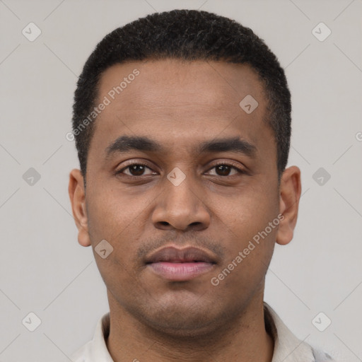 Neutral latino young-adult male with short  black hair and brown eyes