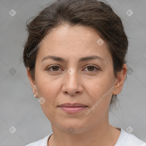 Joyful white adult female with short  brown hair and brown eyes