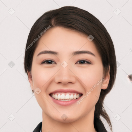 Joyful white young-adult female with medium  black hair and brown eyes