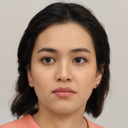 Neutral asian young-adult female with medium  brown hair and brown eyes