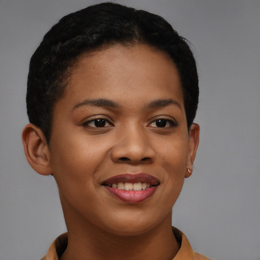 Joyful black young-adult female with short  brown hair and brown eyes