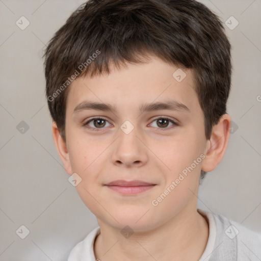 Joyful white child male with short  brown hair and brown eyes