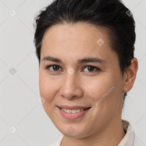 Joyful white young-adult female with medium  brown hair and brown eyes