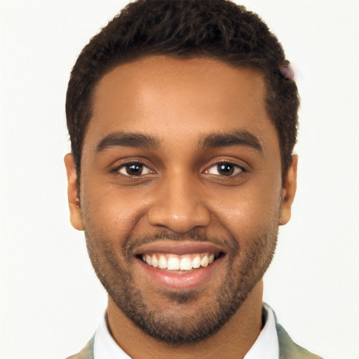 Joyful black young-adult male with short  brown hair and brown eyes