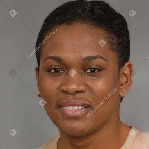 Joyful black young-adult female with short  brown hair and brown eyes