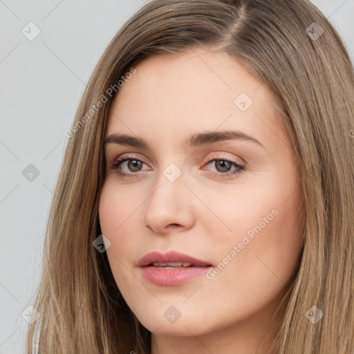 Neutral white young-adult female with long  brown hair and brown eyes