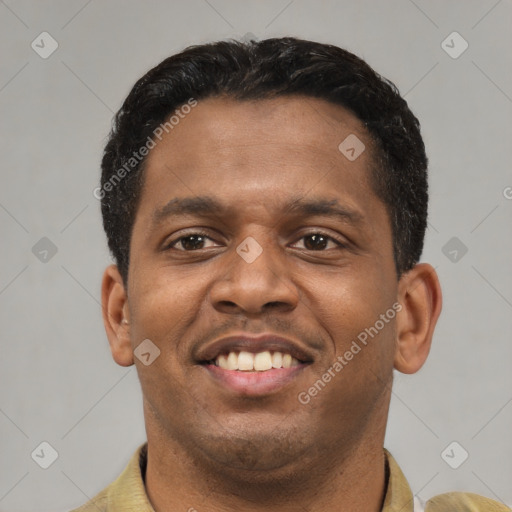 Joyful latino young-adult male with short  black hair and brown eyes