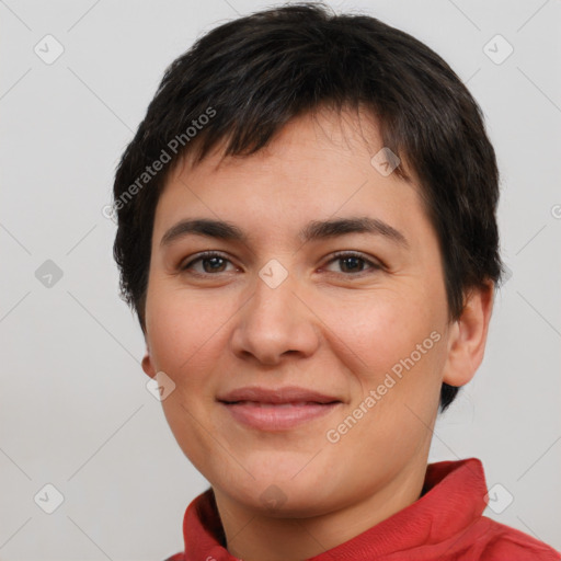 Joyful white young-adult female with short  brown hair and brown eyes