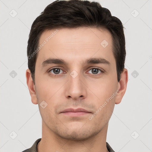 Neutral white young-adult male with short  brown hair and brown eyes