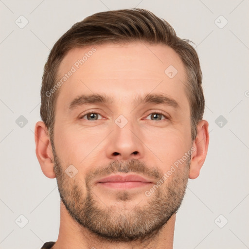 Joyful white young-adult male with short  brown hair and brown eyes