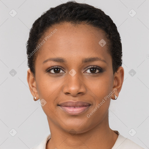 Joyful black young-adult female with short  black hair and brown eyes