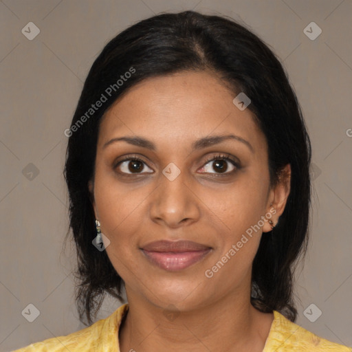 Joyful black young-adult female with medium  black hair and brown eyes