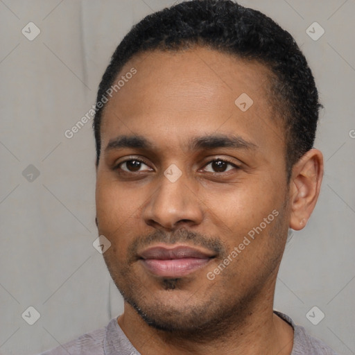 Joyful latino young-adult male with short  black hair and brown eyes