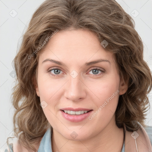 Joyful white young-adult female with medium  brown hair and green eyes