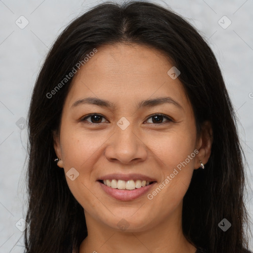 Joyful asian young-adult female with long  brown hair and brown eyes