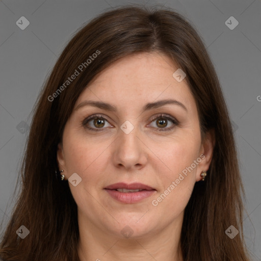 Joyful white adult female with long  brown hair and brown eyes