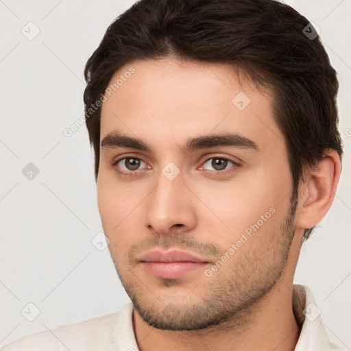 Neutral white young-adult male with short  brown hair and brown eyes