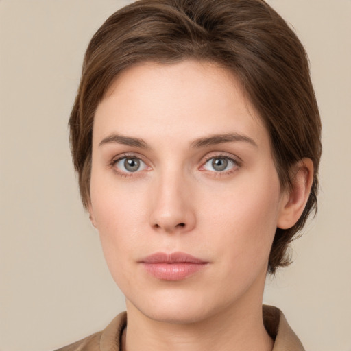 Neutral white young-adult female with medium  brown hair and grey eyes