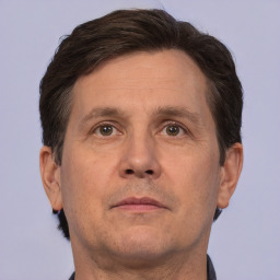 Neutral white adult male with short  brown hair and brown eyes