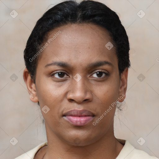 Joyful latino young-adult female with short  brown hair and brown eyes