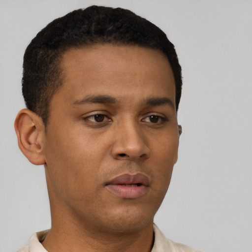 Neutral black young-adult male with short  brown hair and brown eyes