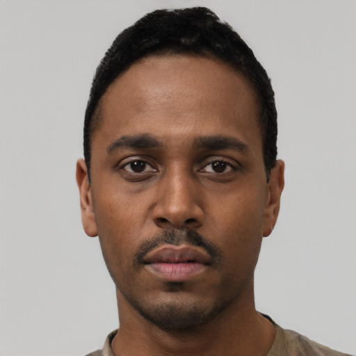 Neutral black young-adult male with short  black hair and brown eyes