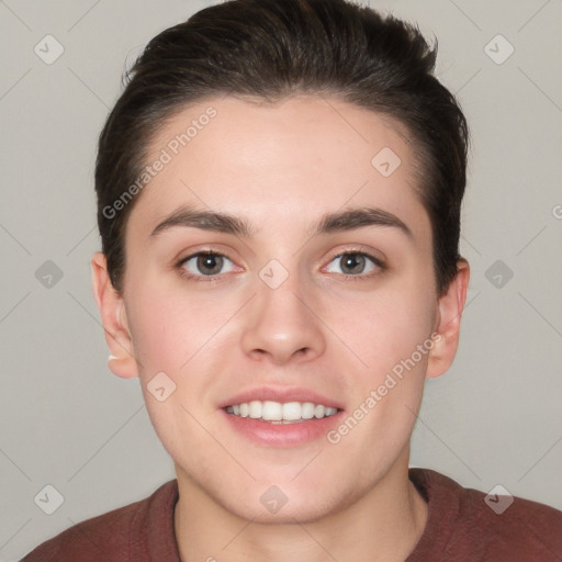 Joyful white young-adult female with short  brown hair and brown eyes