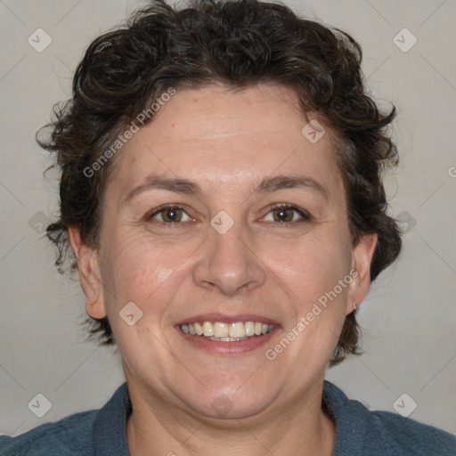 Joyful white adult female with medium  brown hair and blue eyes