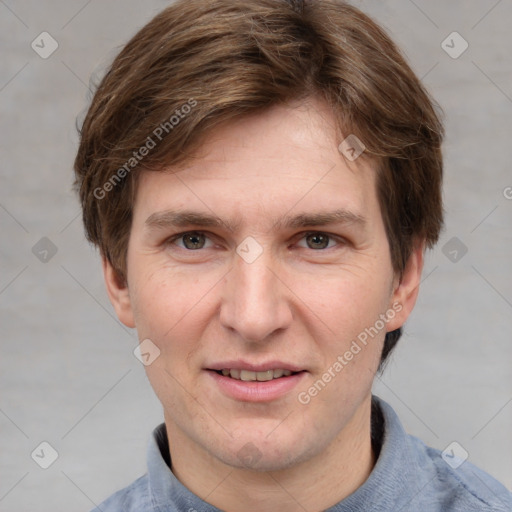 Joyful white adult male with short  brown hair and grey eyes