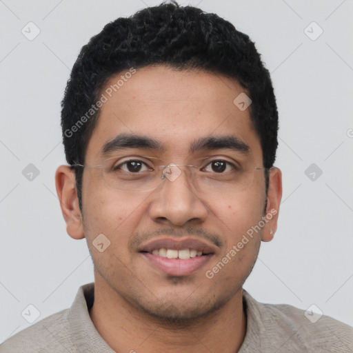 Joyful latino young-adult male with short  black hair and brown eyes