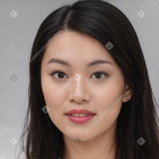 Joyful asian young-adult female with long  brown hair and brown eyes