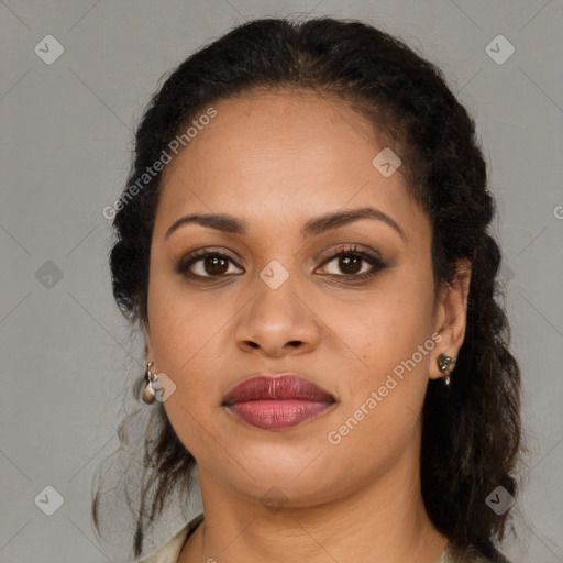 Joyful latino young-adult female with long  brown hair and brown eyes