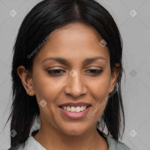 Joyful latino young-adult female with medium  brown hair and brown eyes