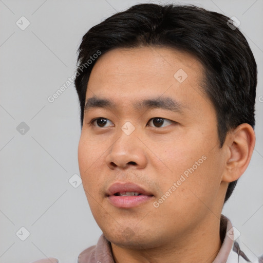 Neutral asian young-adult male with short  black hair and brown eyes