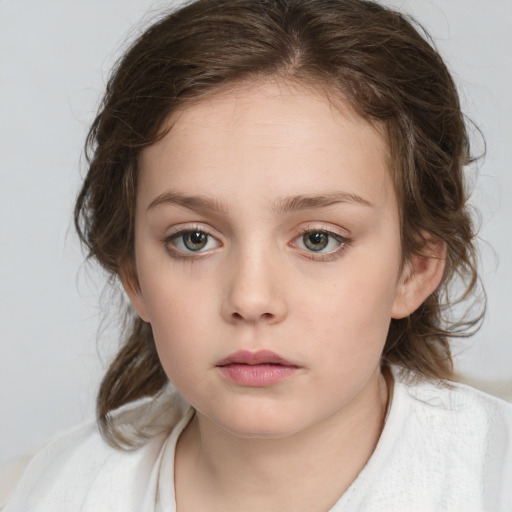 Neutral white child female with medium  brown hair and grey eyes