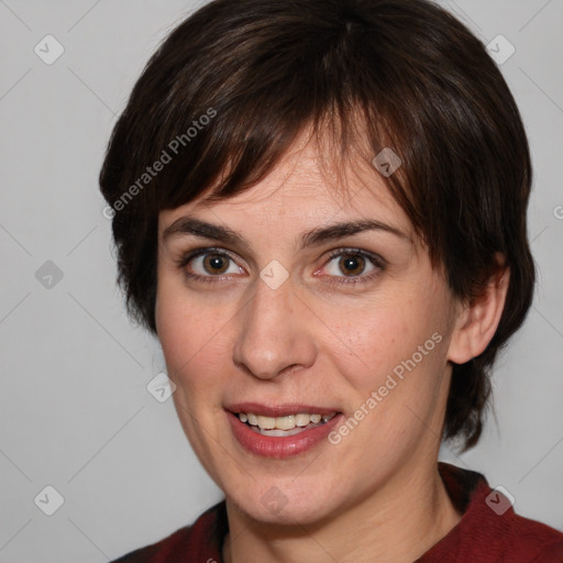 Joyful white adult female with medium  brown hair and brown eyes