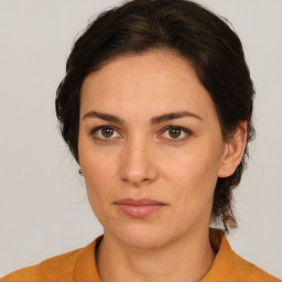 Neutral white young-adult female with medium  brown hair and brown eyes