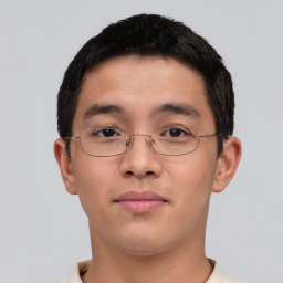 Neutral asian young-adult male with short  brown hair and brown eyes