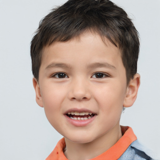 Joyful white child male with short  brown hair and brown eyes